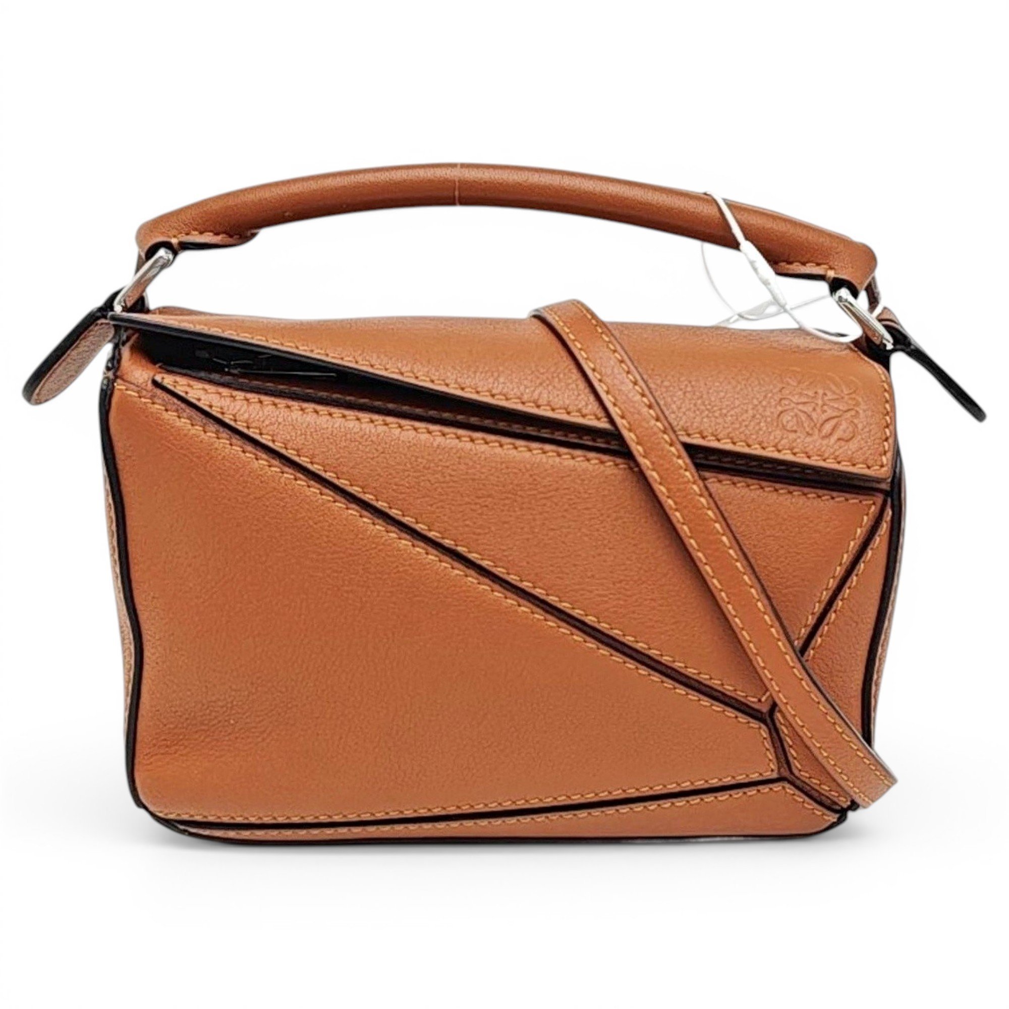 Puzzle leather handbag