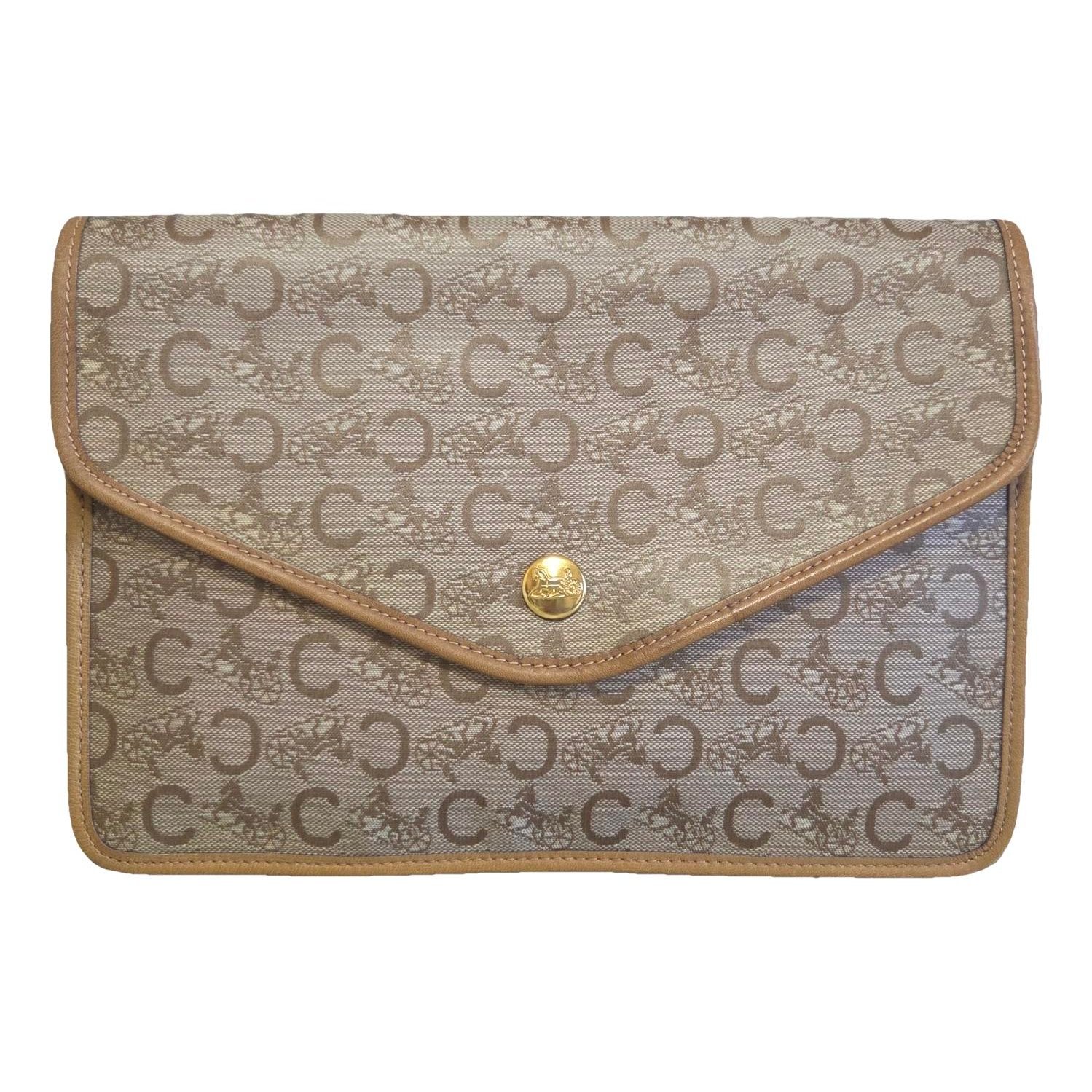 Triomphe Vintage leather clutch bag