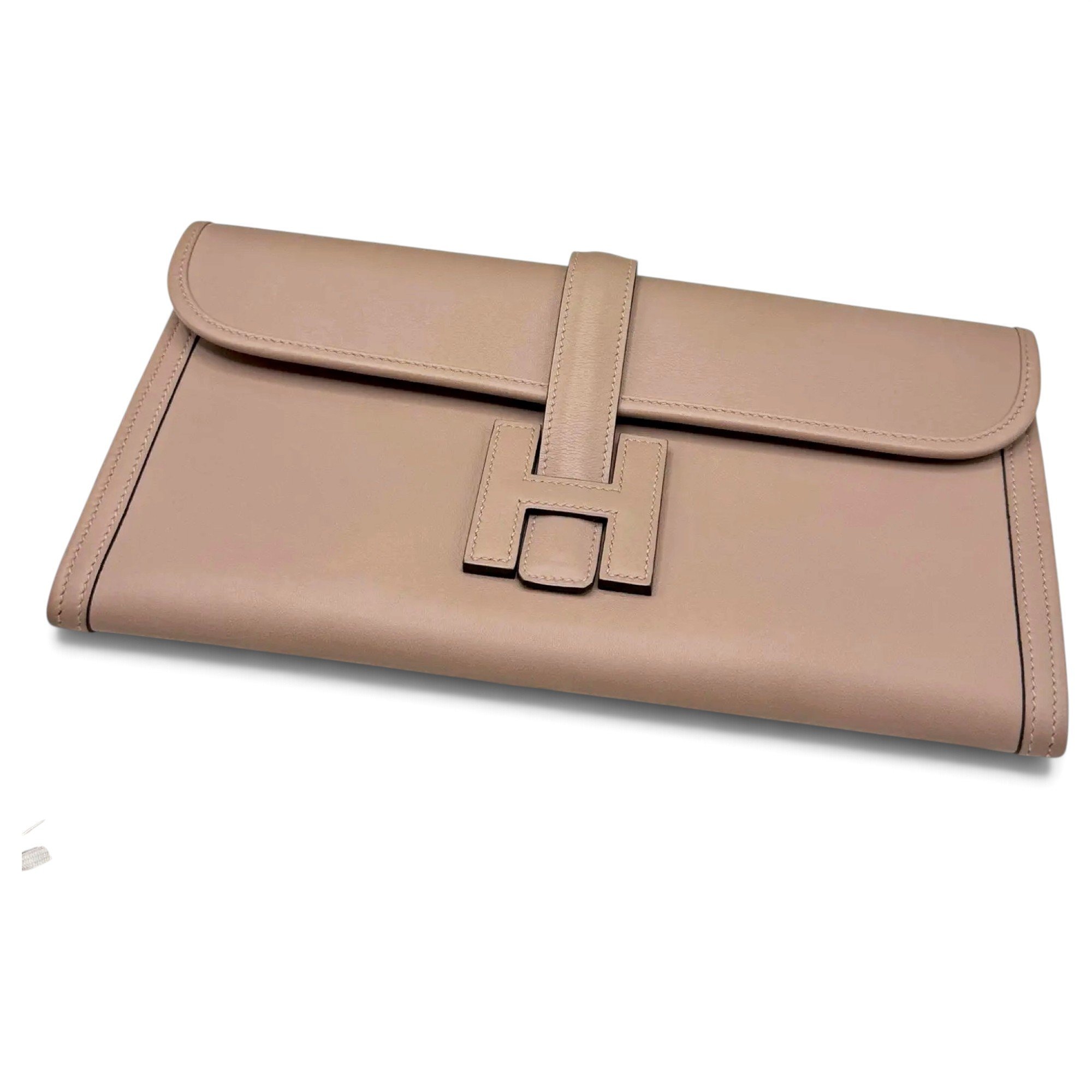 Jige leather clutch bag