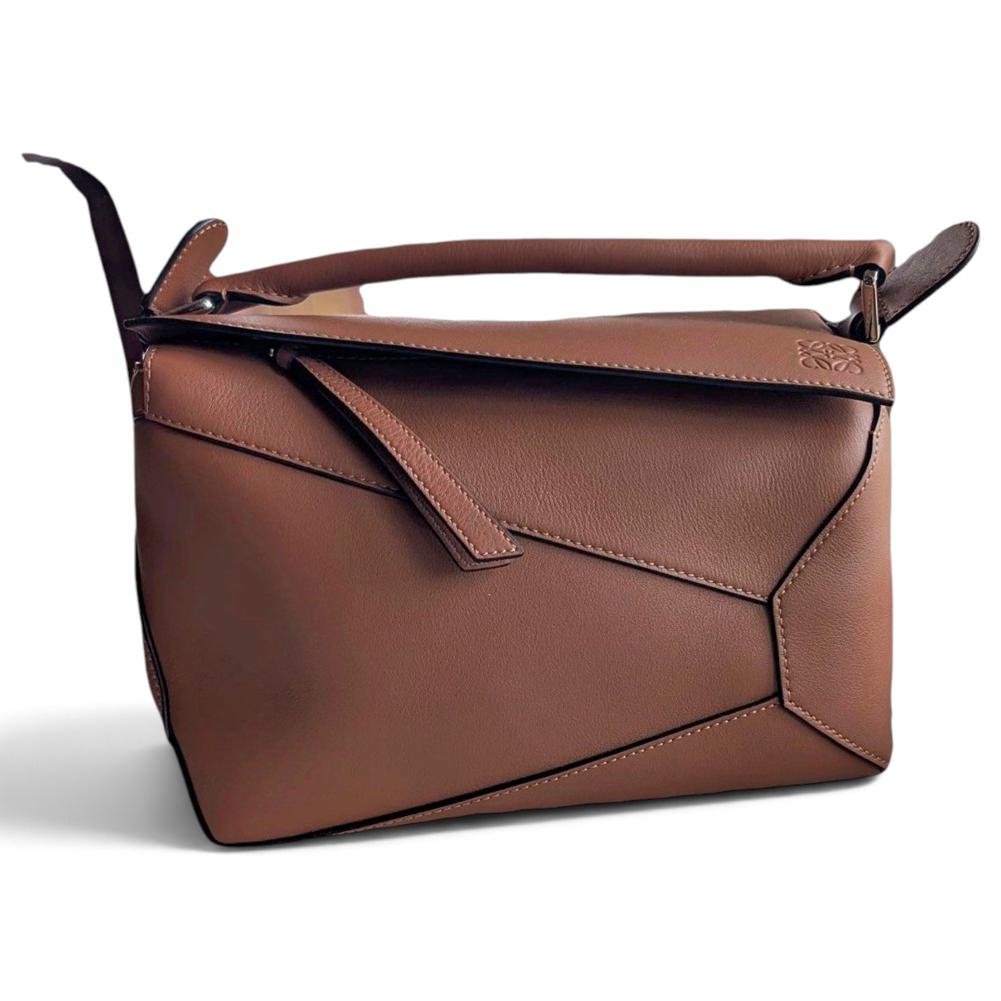 Puzzle leather handbag