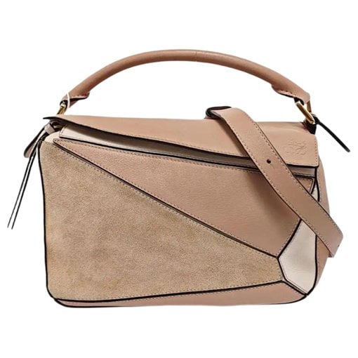 Puzzle leather handbag