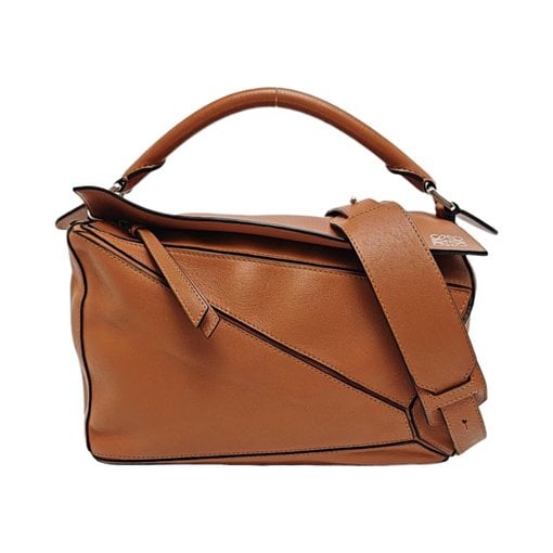 Puzzle leather handbag