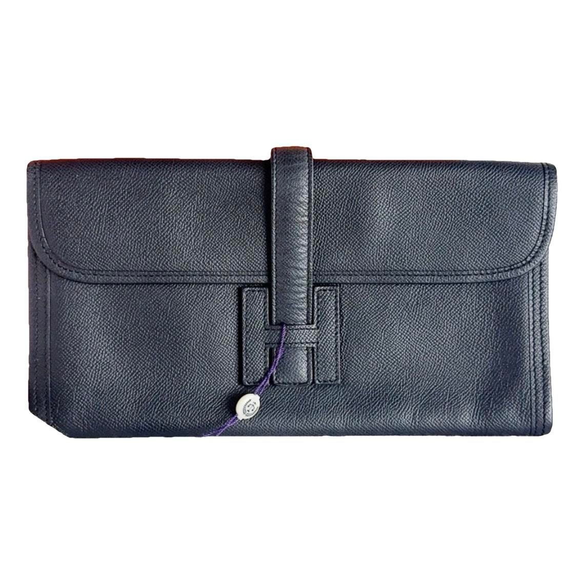 Jige leather clutch bag