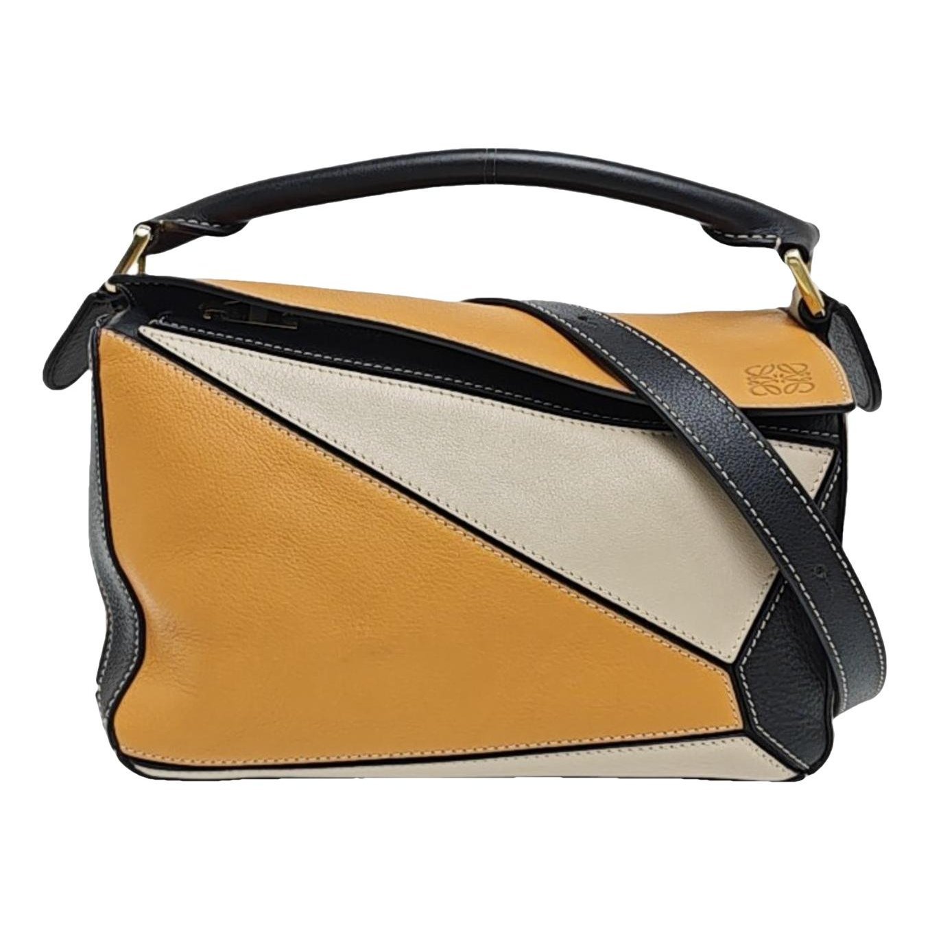 Puzzle leather handbag