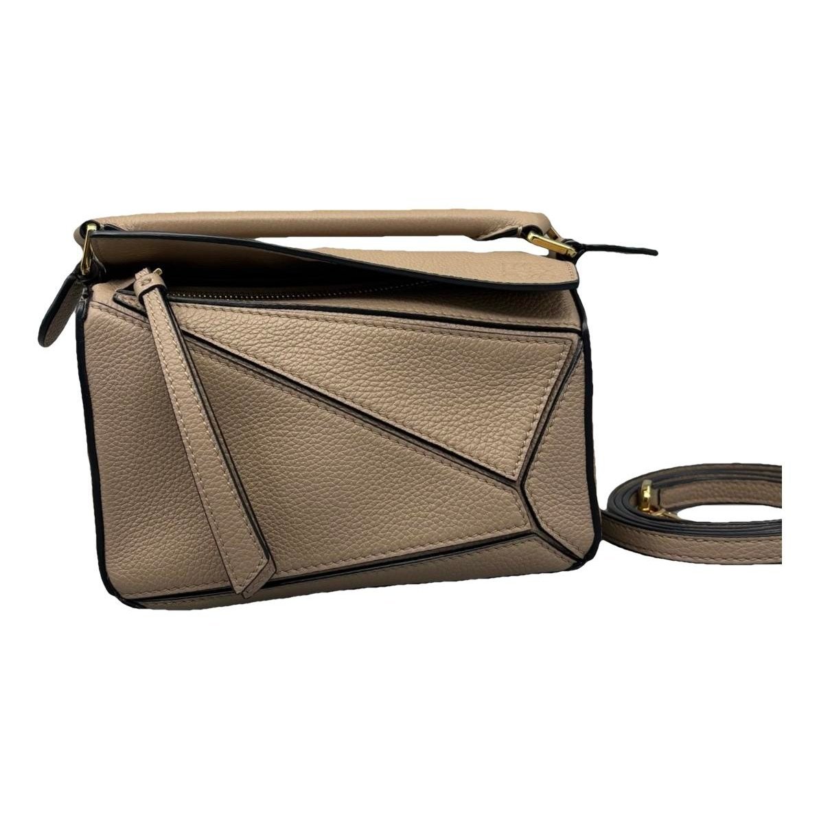 Puzzle leather handbag