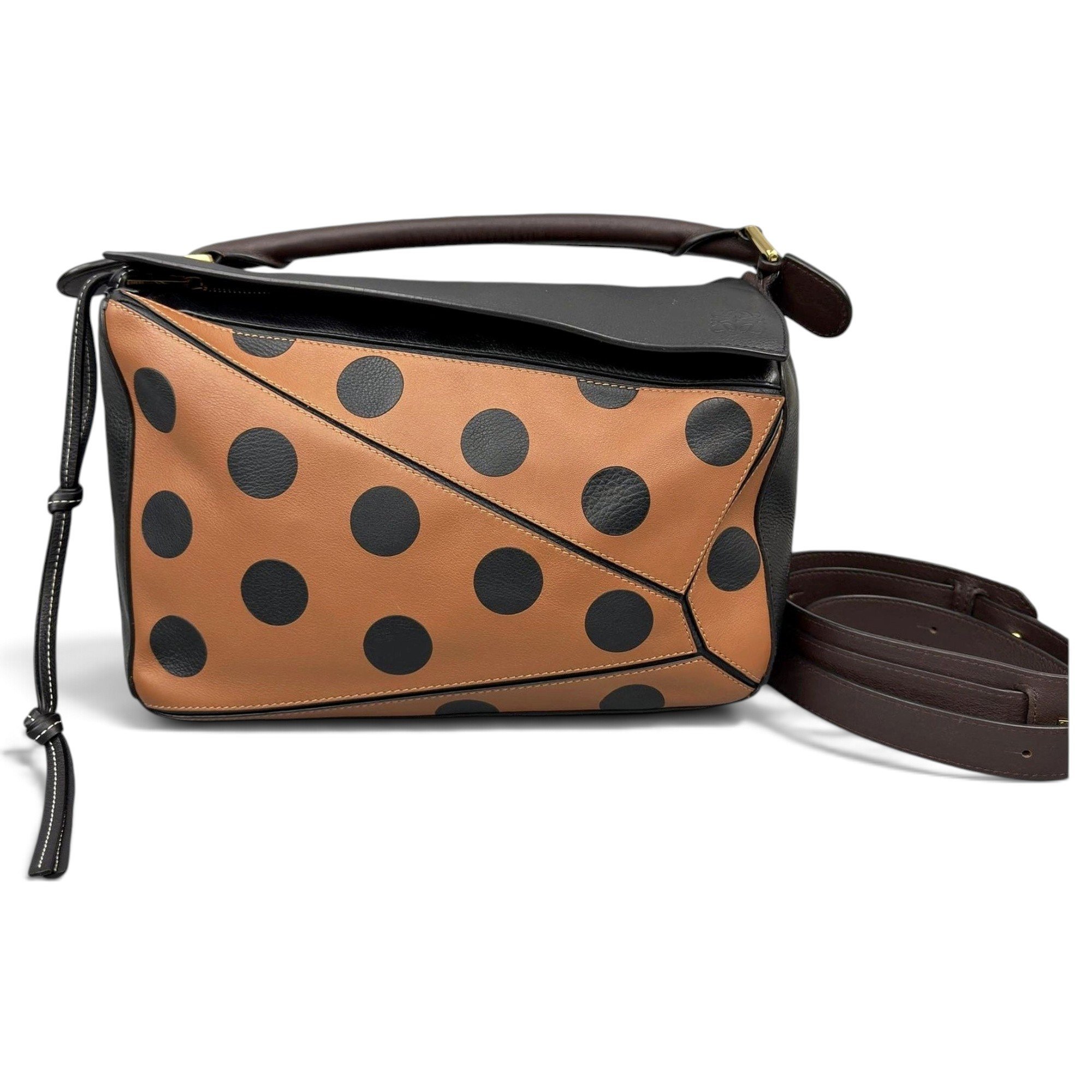 Puzzle leather handbag