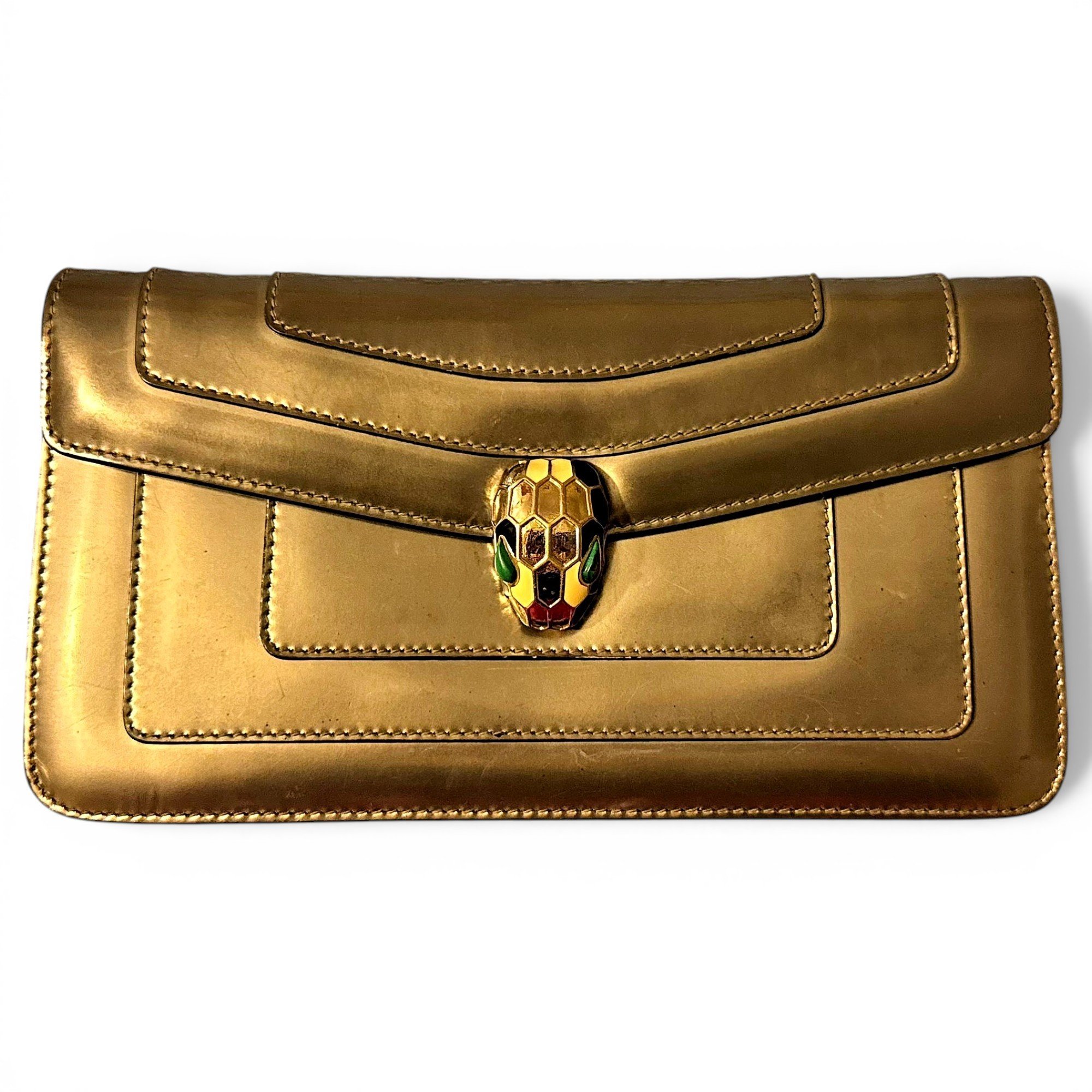 Serpenti leather clutch bag