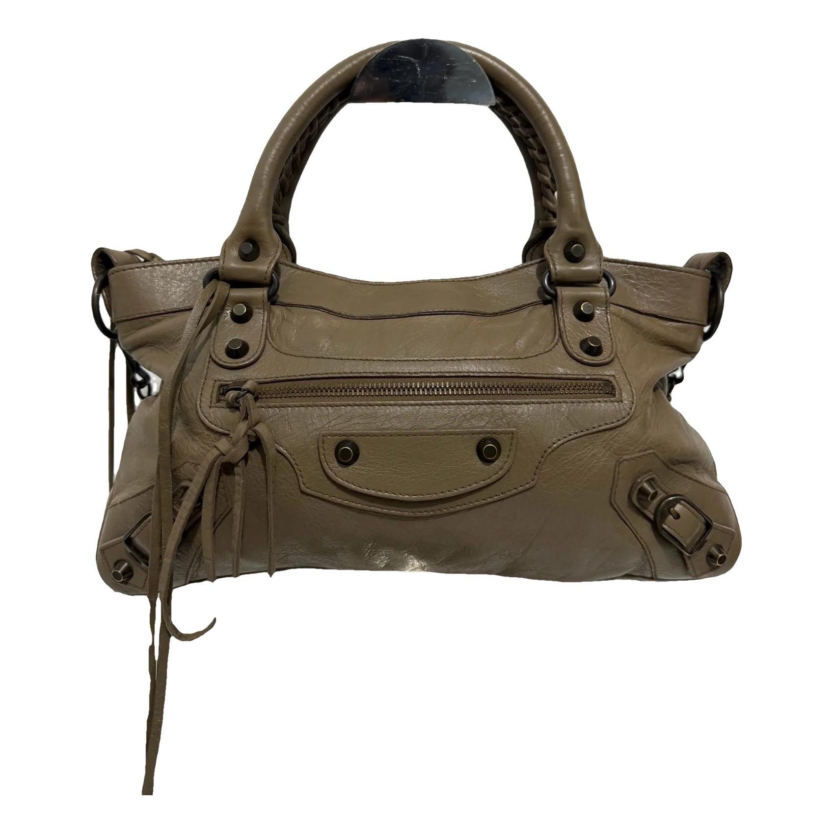 First leather handbag