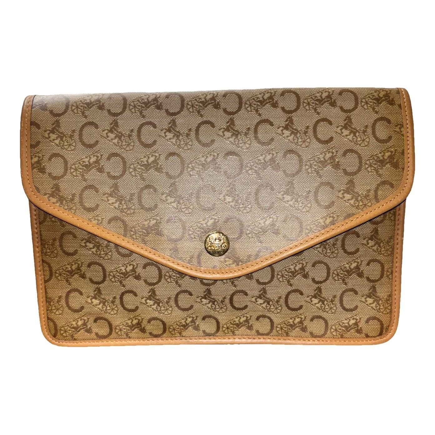 Triomphe Vintage leather clutch bag