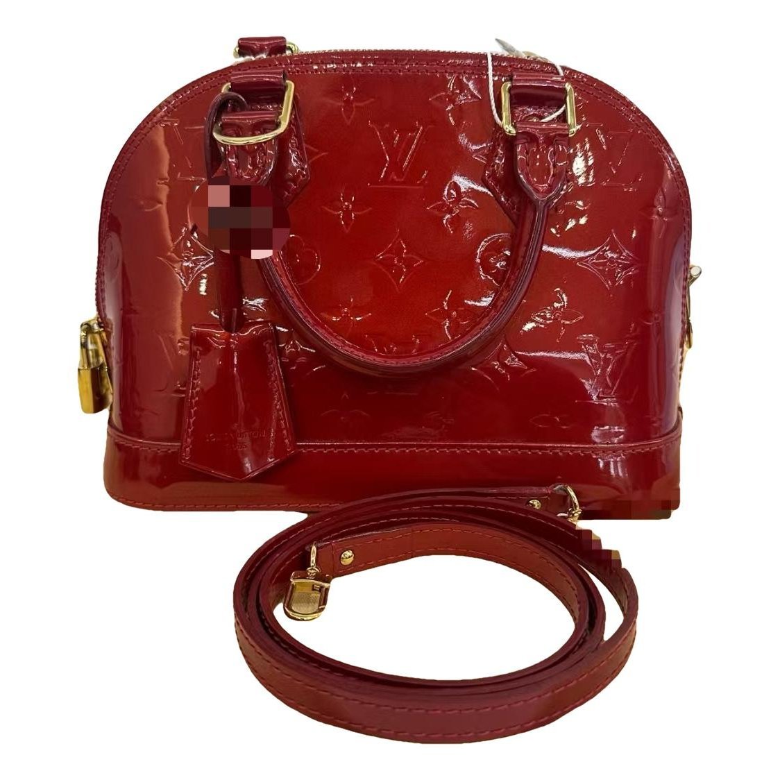 Alma patent leather handbag