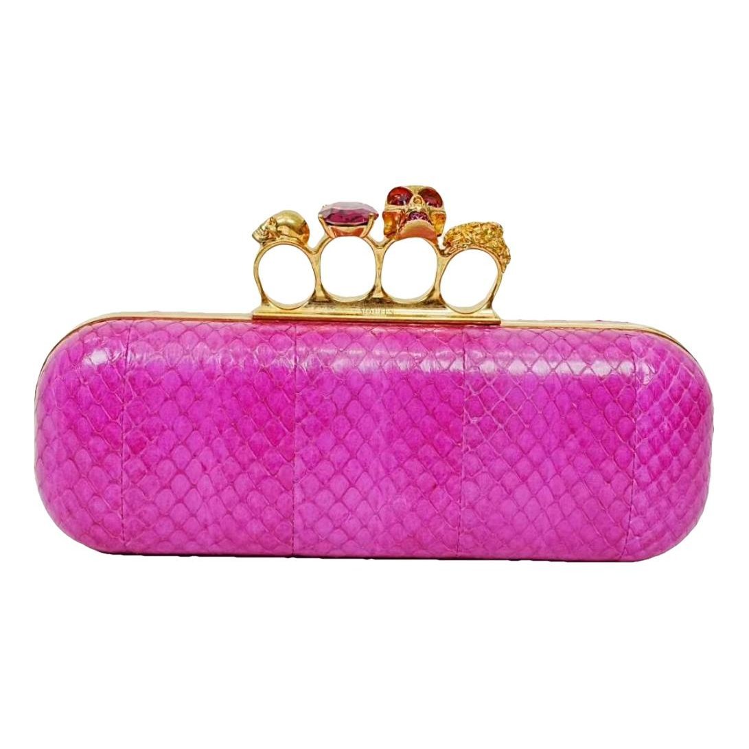 Knuckle leather clutch bag