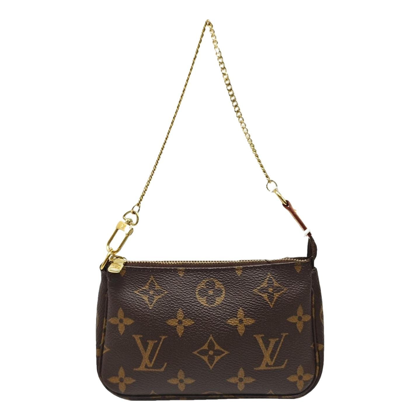 Maxi Multi Pochette Accessoires leather handbag