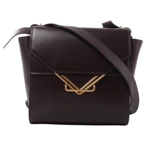 Clip leather handbag