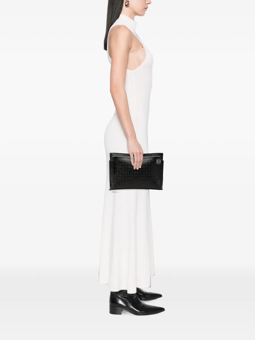 2015-2026 Embossed Anagram Leather Repeat T clutch bag