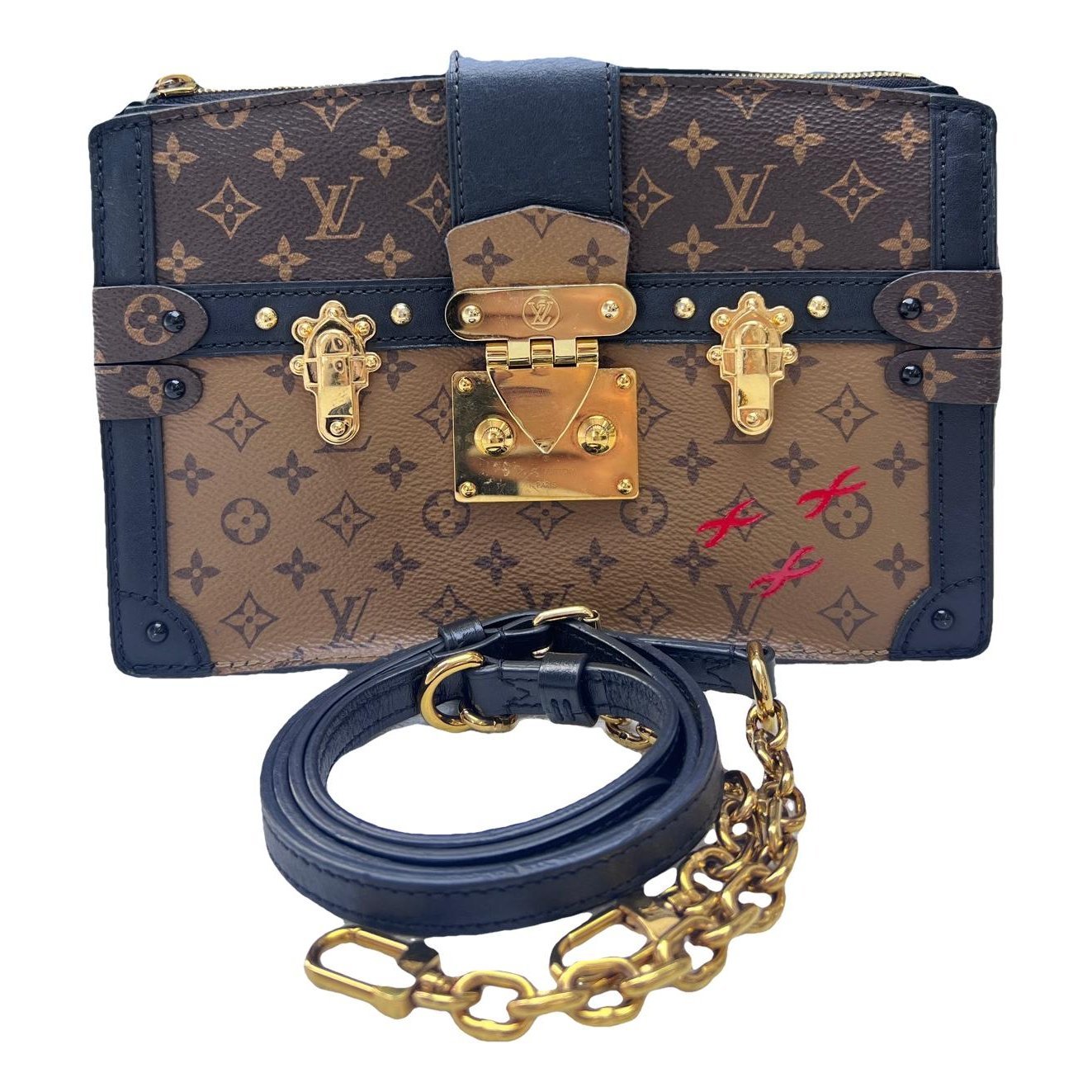 Pochette Trunk leather handbag