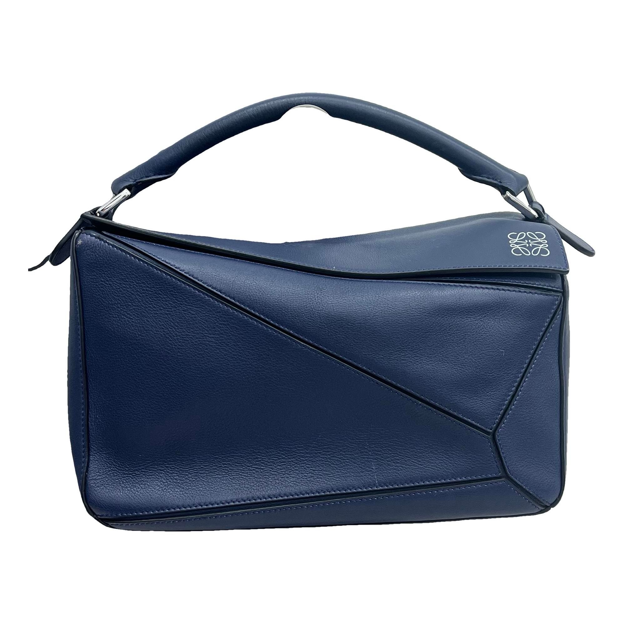 Puzzle leather handbag