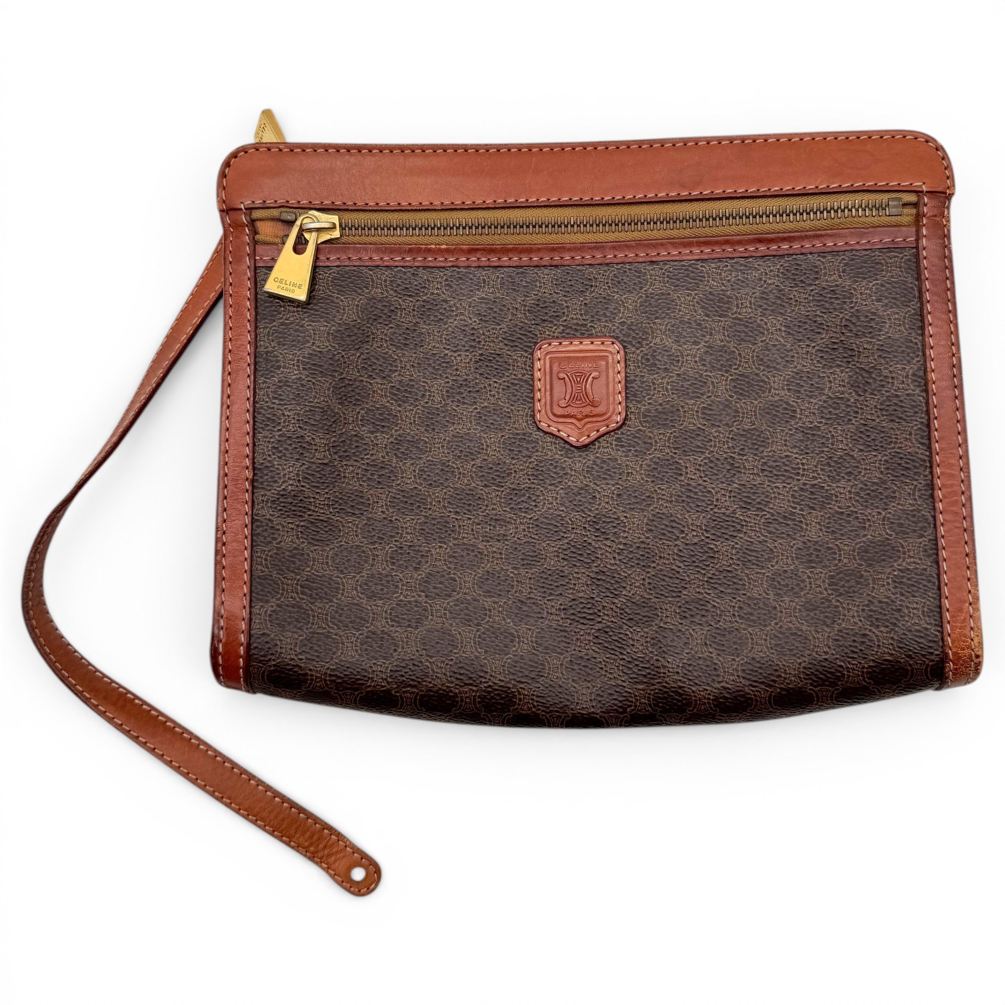 Triomphe Vintage leather clutch bag