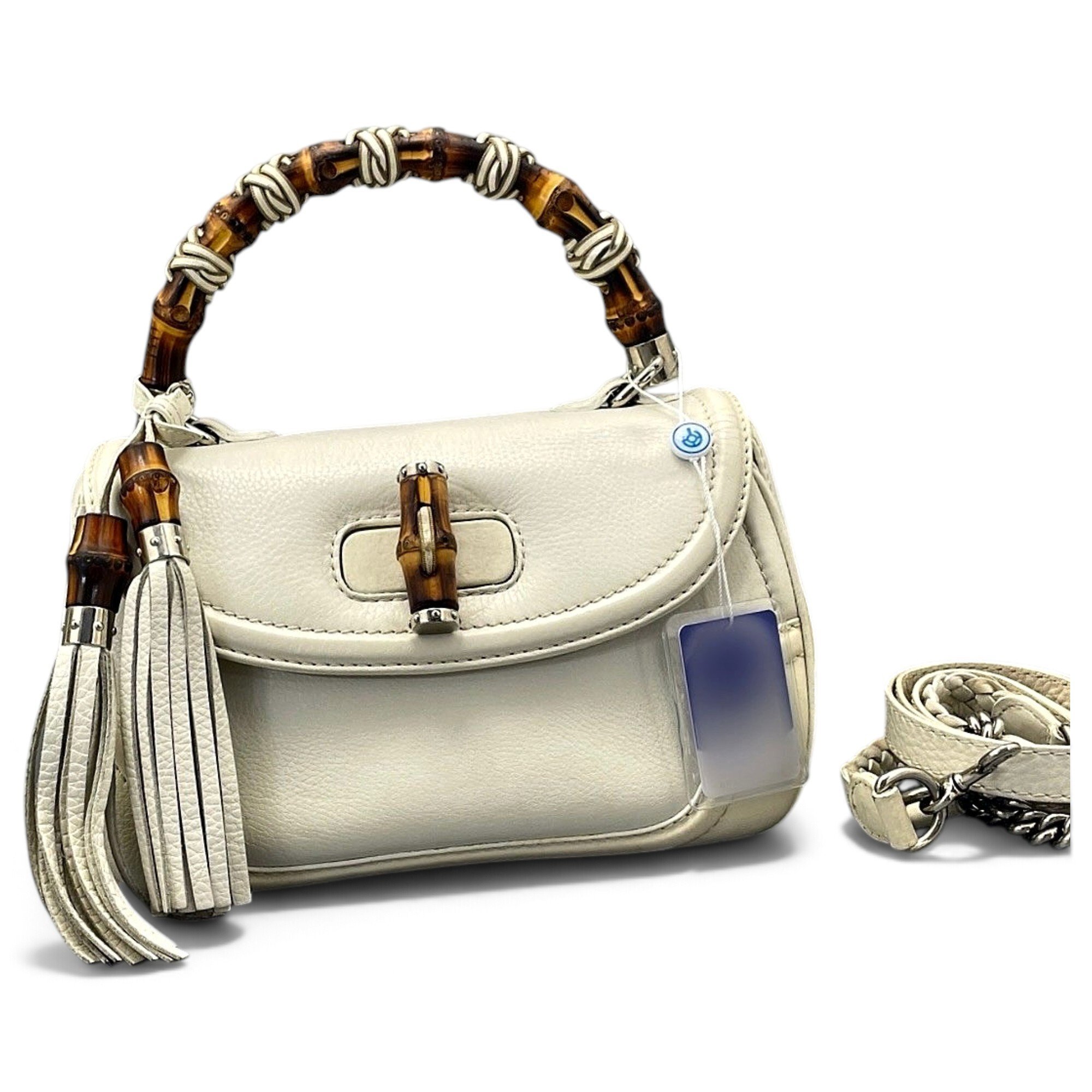 Convertible Pompon Bamboo Top Handle leather handbag