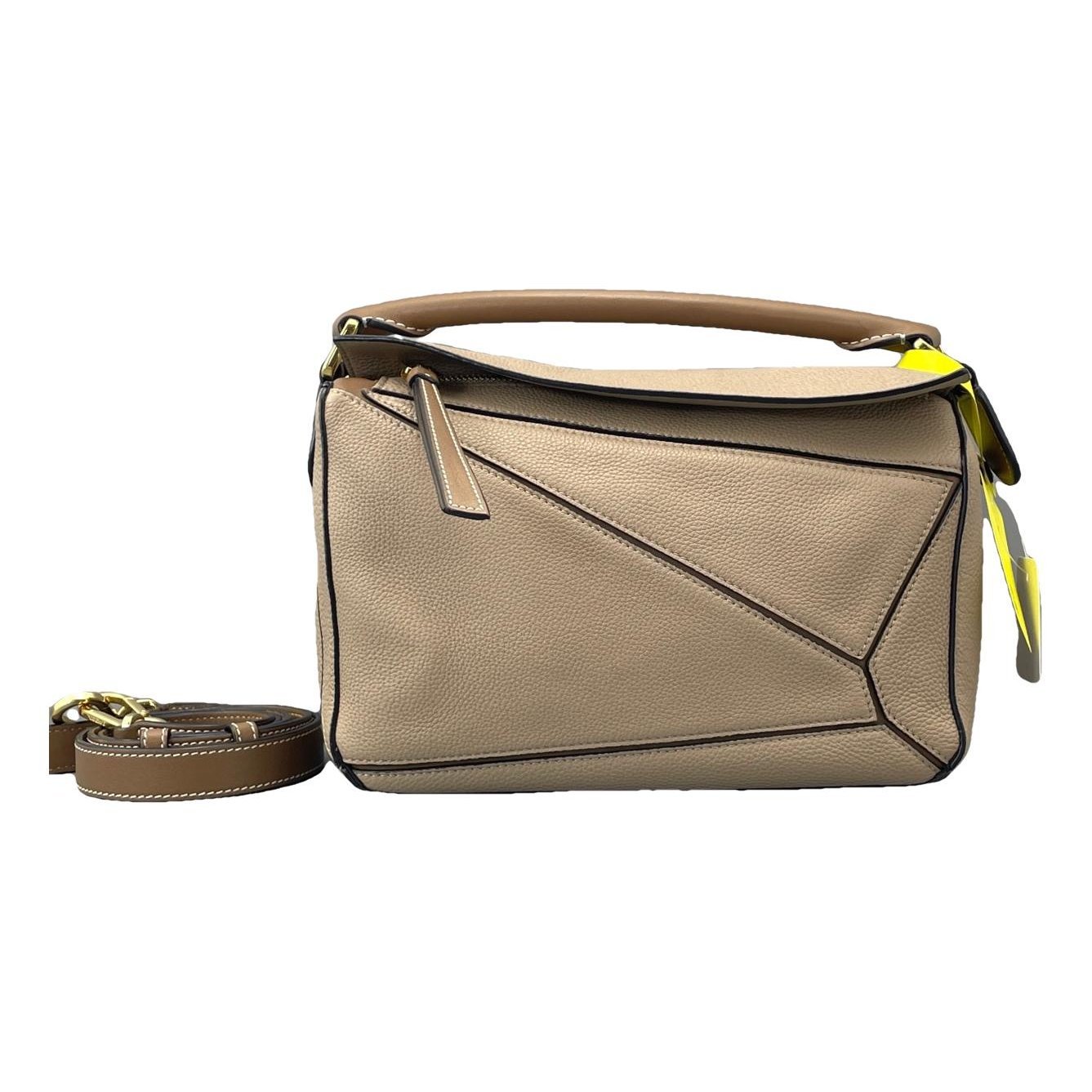 Puzzle leather handbag