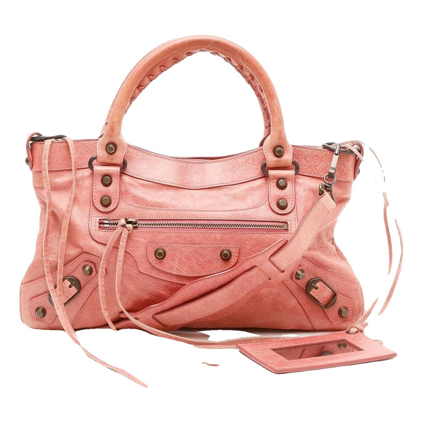 First leather handbag