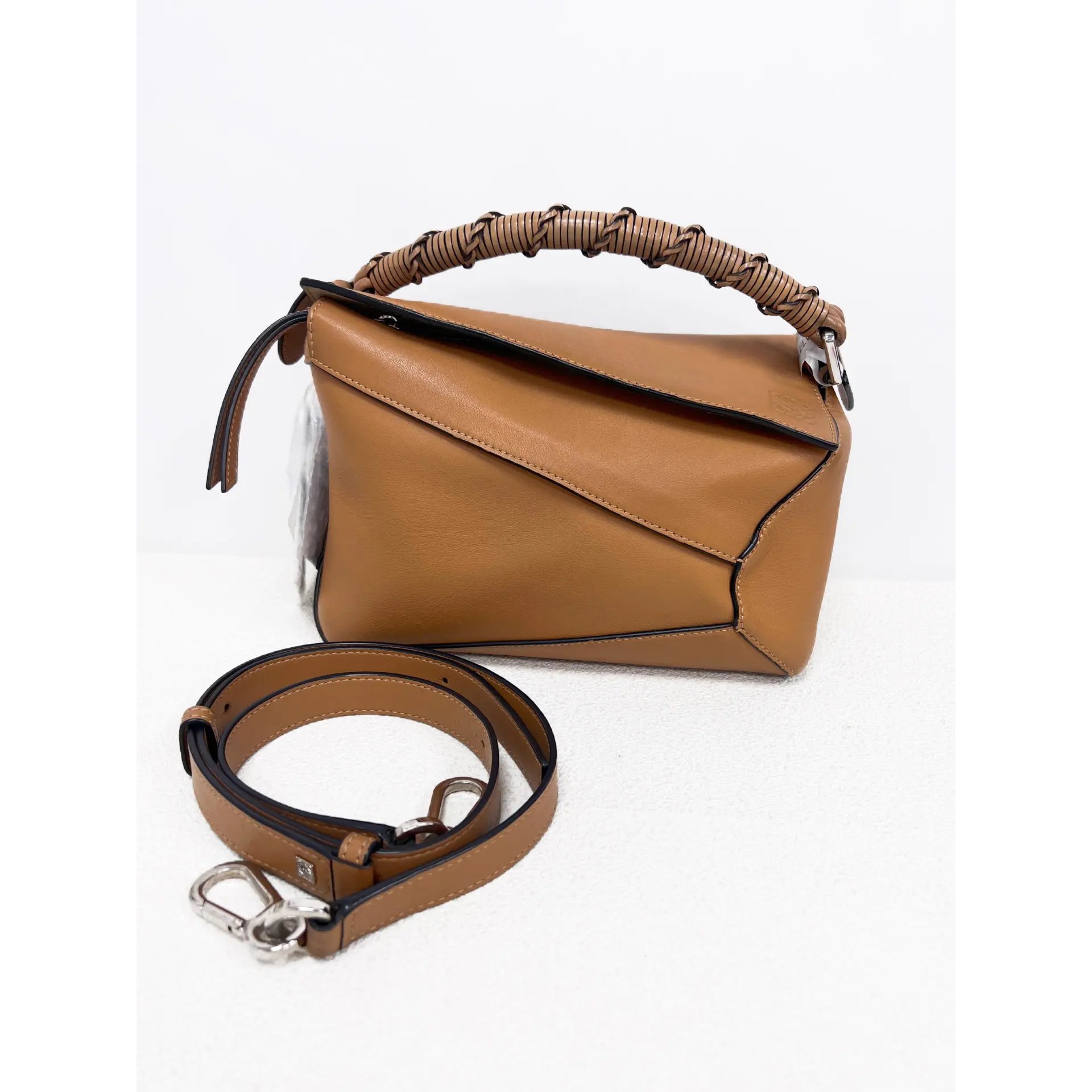 Puzzle leather crossbody bag