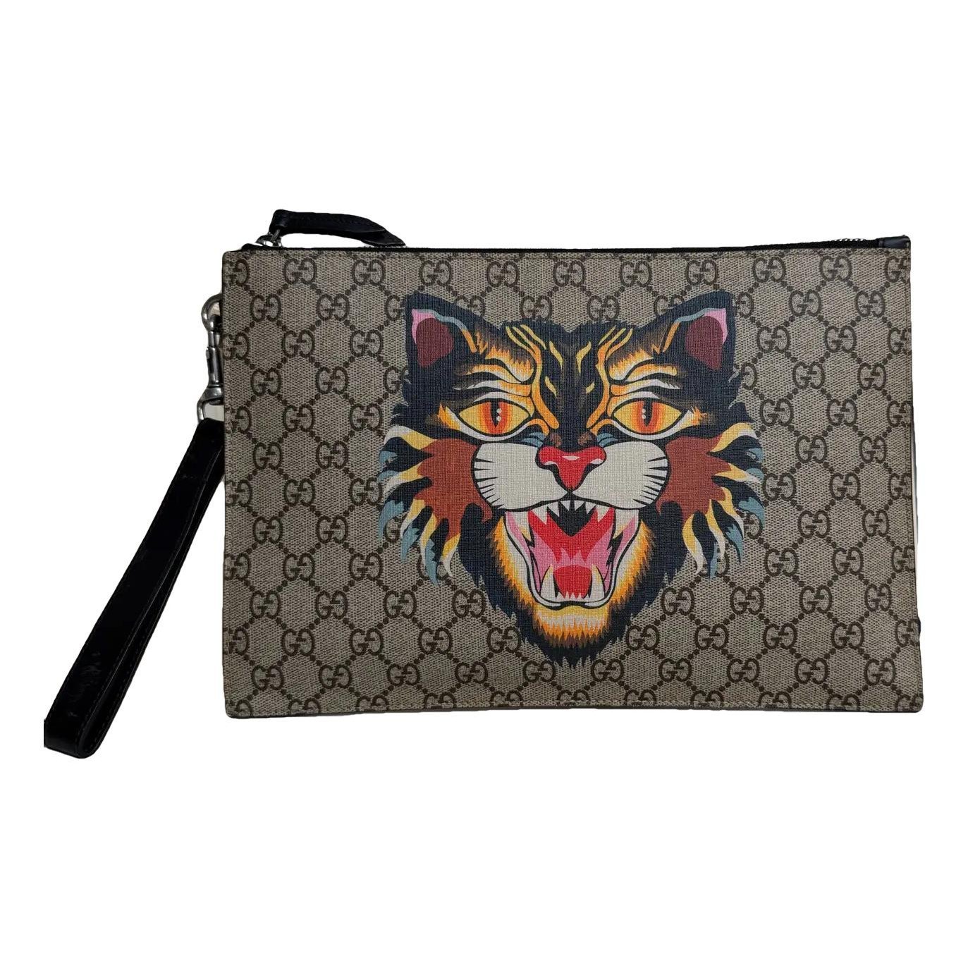 Ophidia vinyl clutch bag
