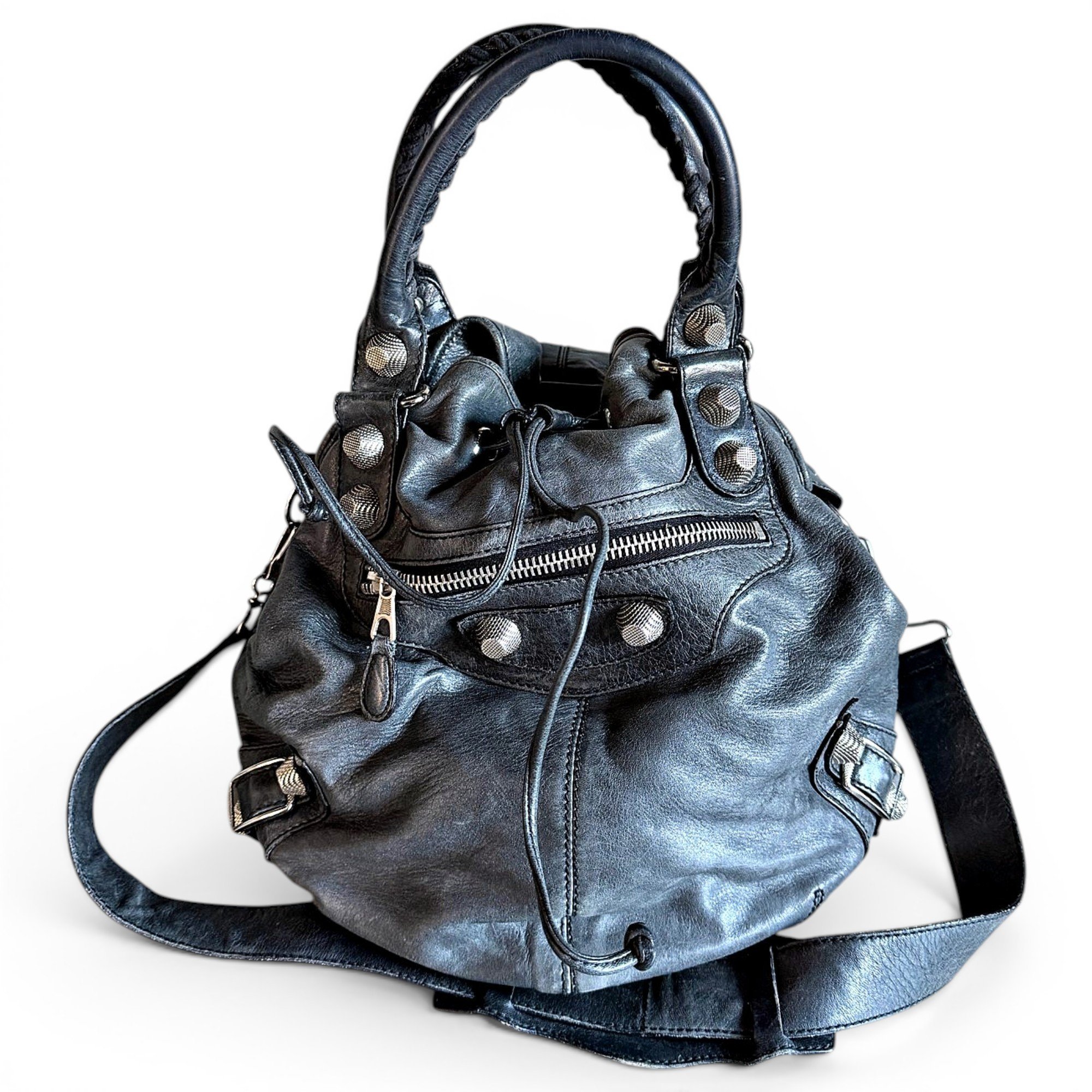 Pompon leather handbag