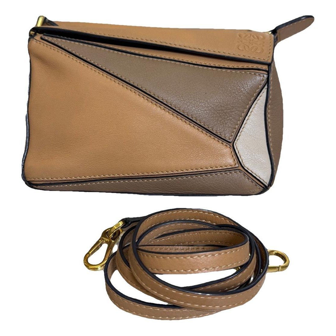 Puzzle leather handbag
