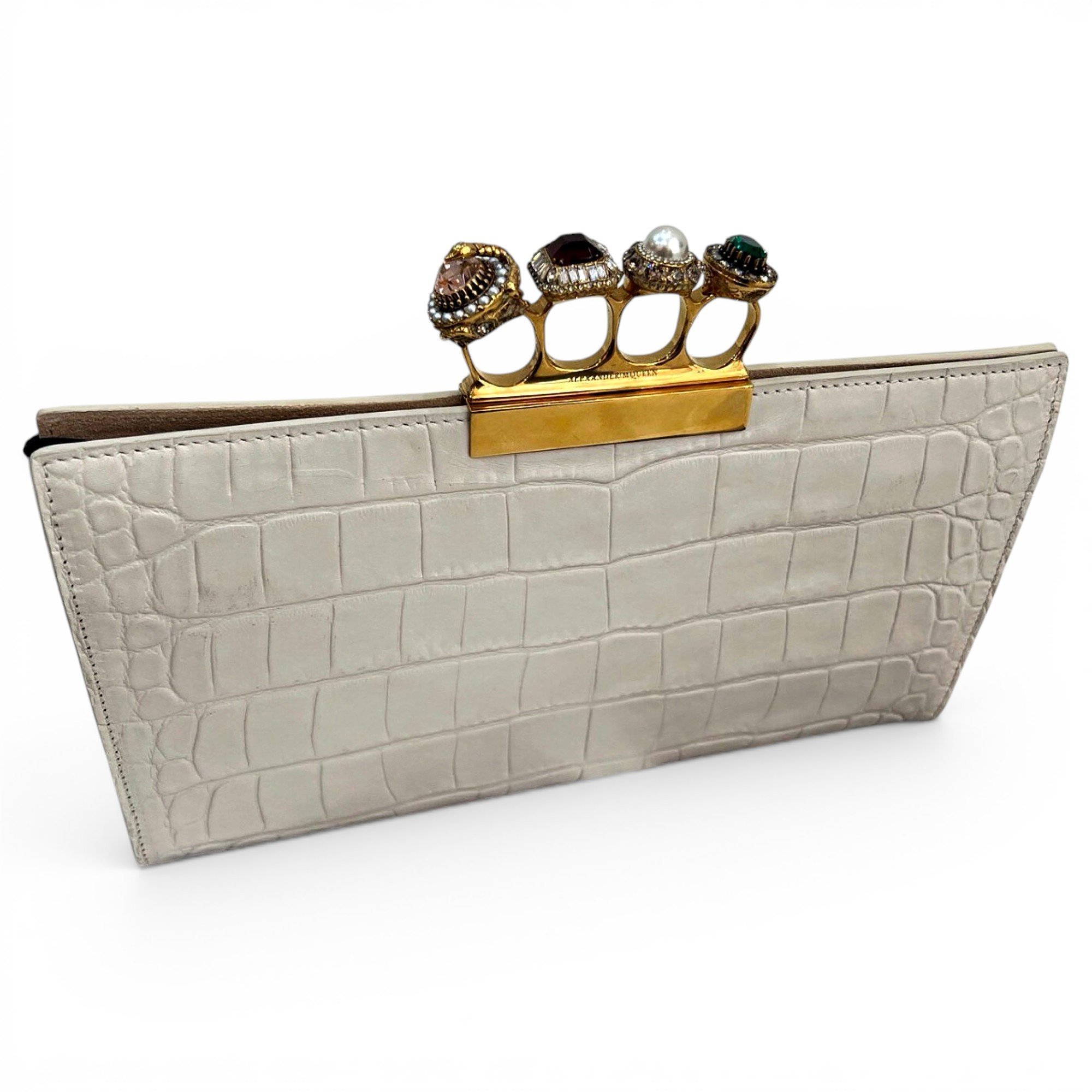 Knuckle leather clutch bag