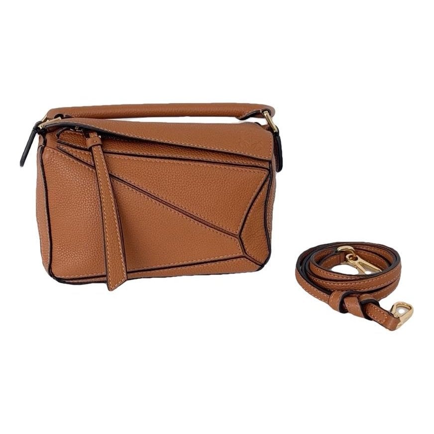 Puzzle leather handbag