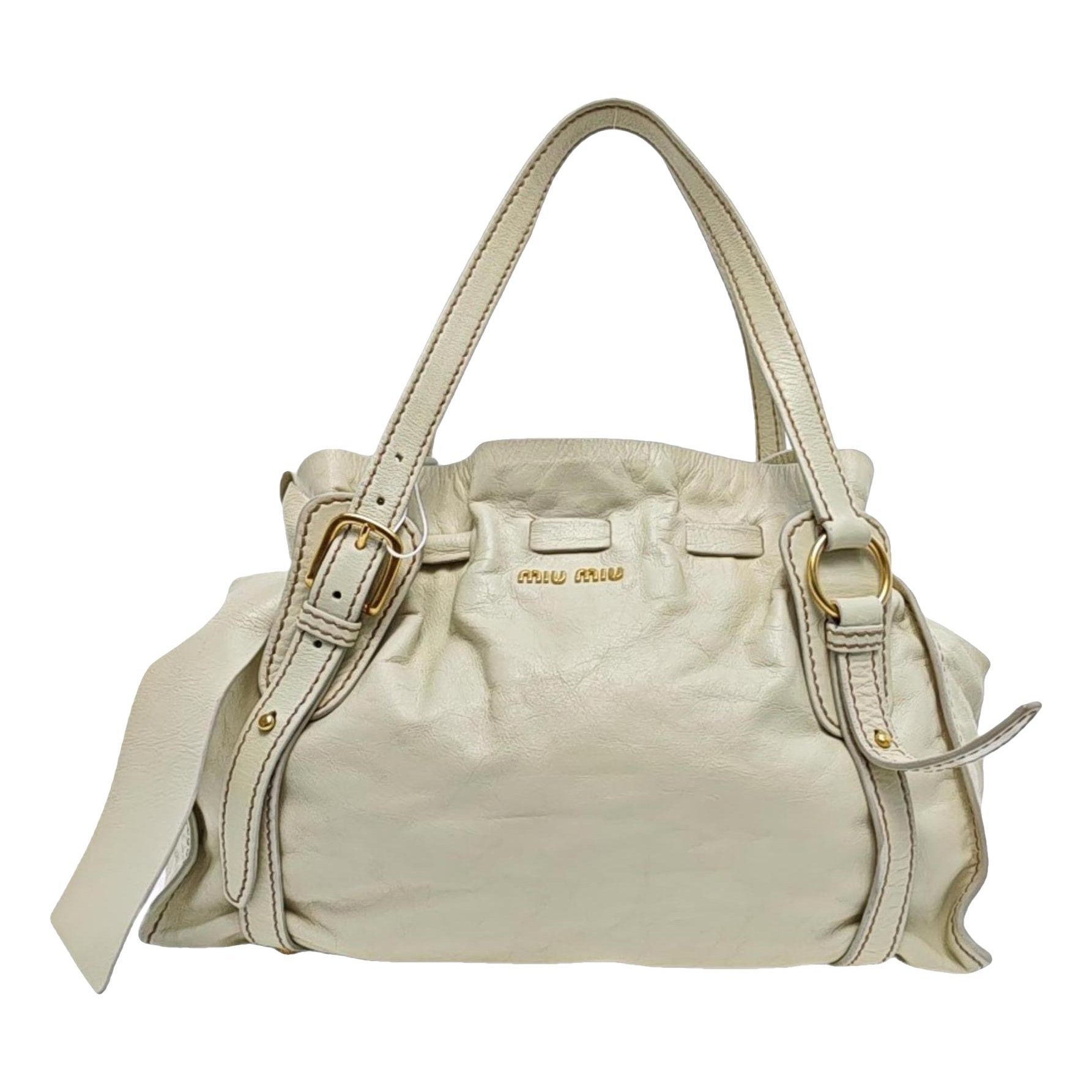 Bow bag leather handbag