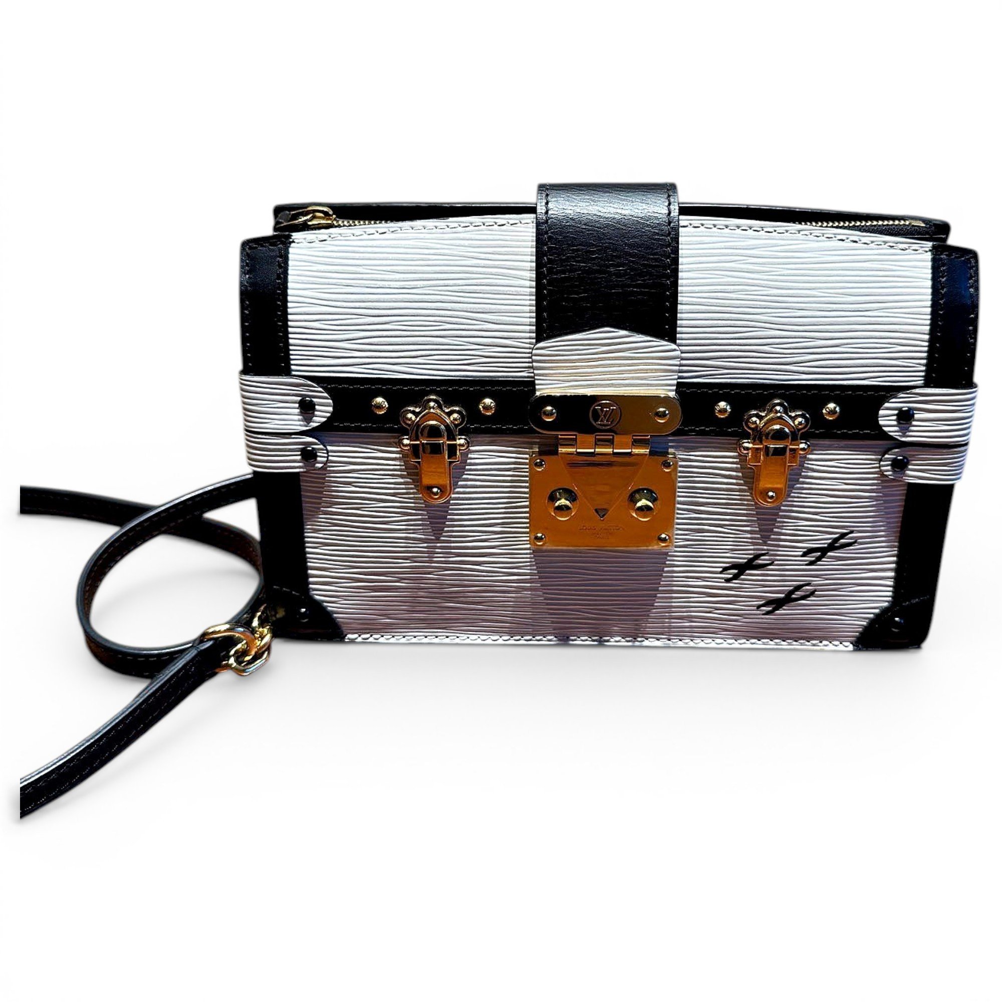Pochette Trunk leather handbag