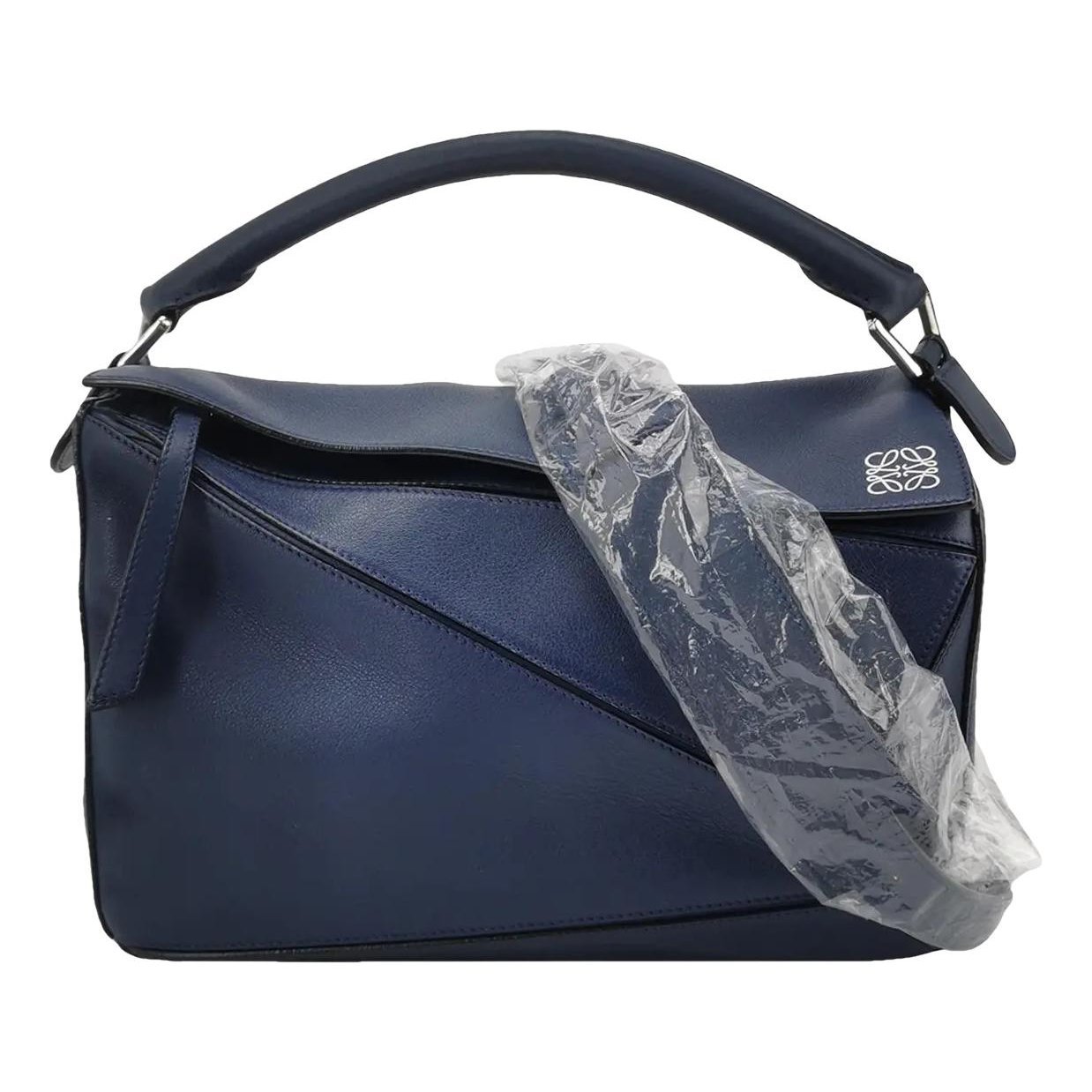 Puzzle leather handbag