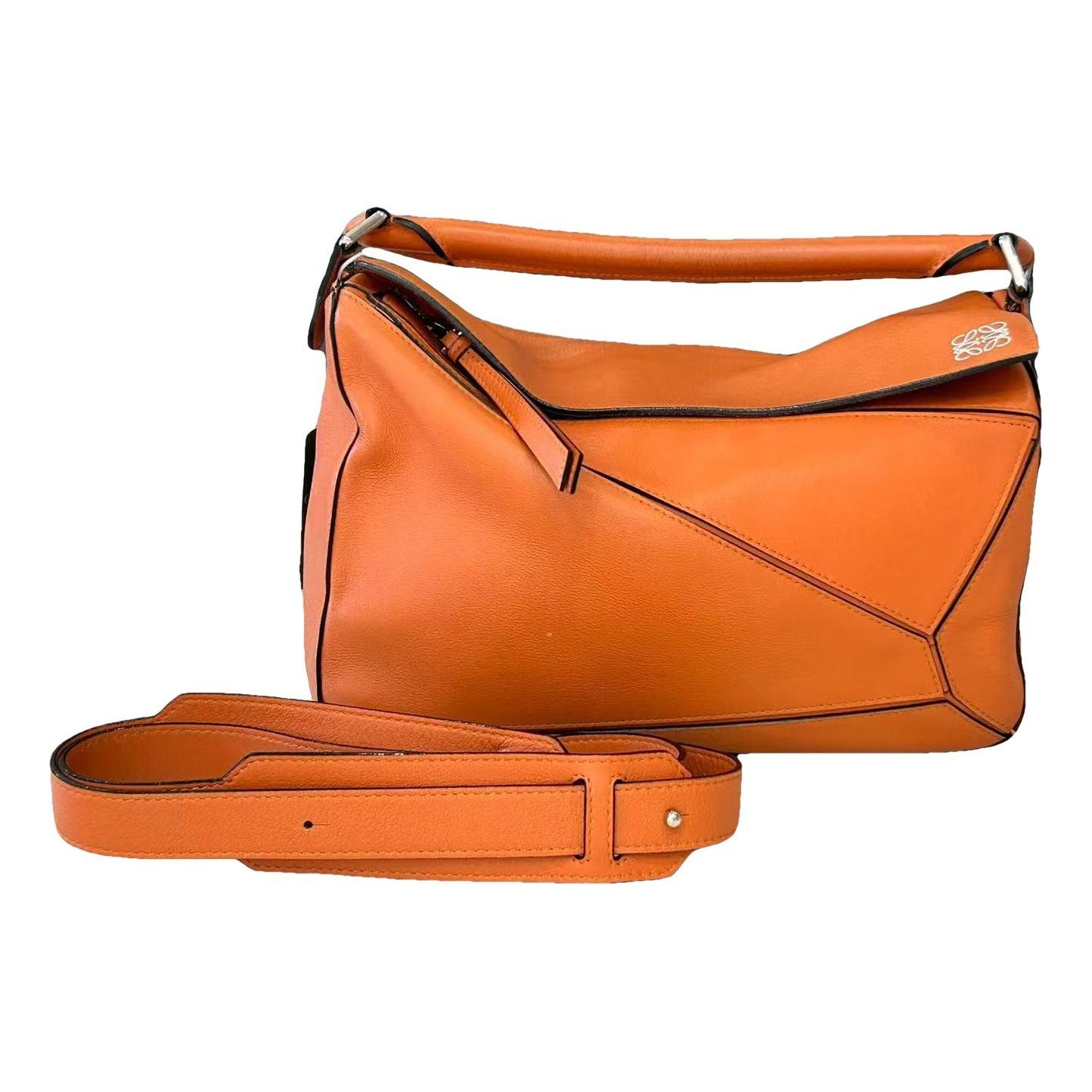 Puzzle leather handbag