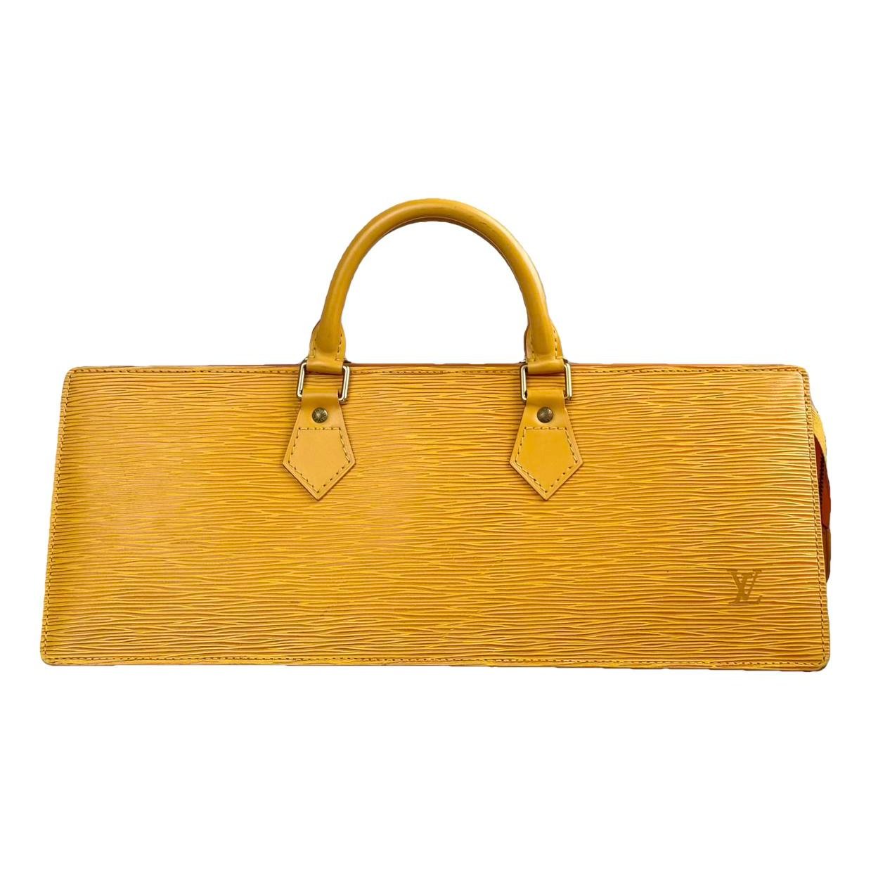 Triangle leather handbag
