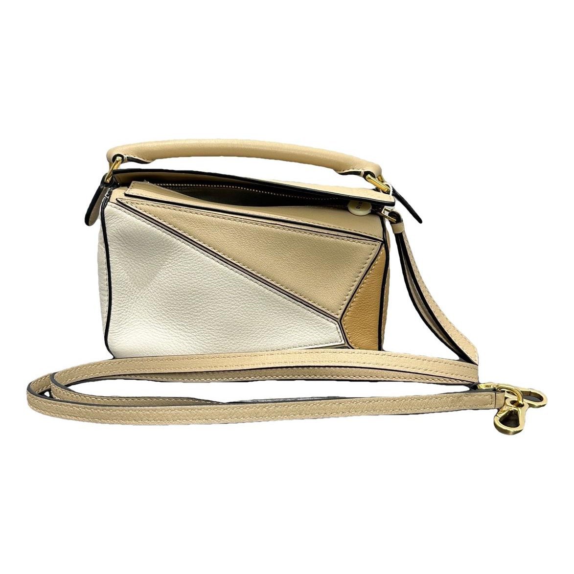 Puzzle leather handbag