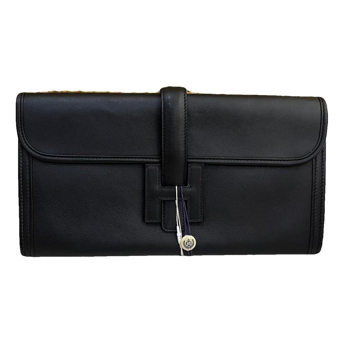 Jige leather clutch bag