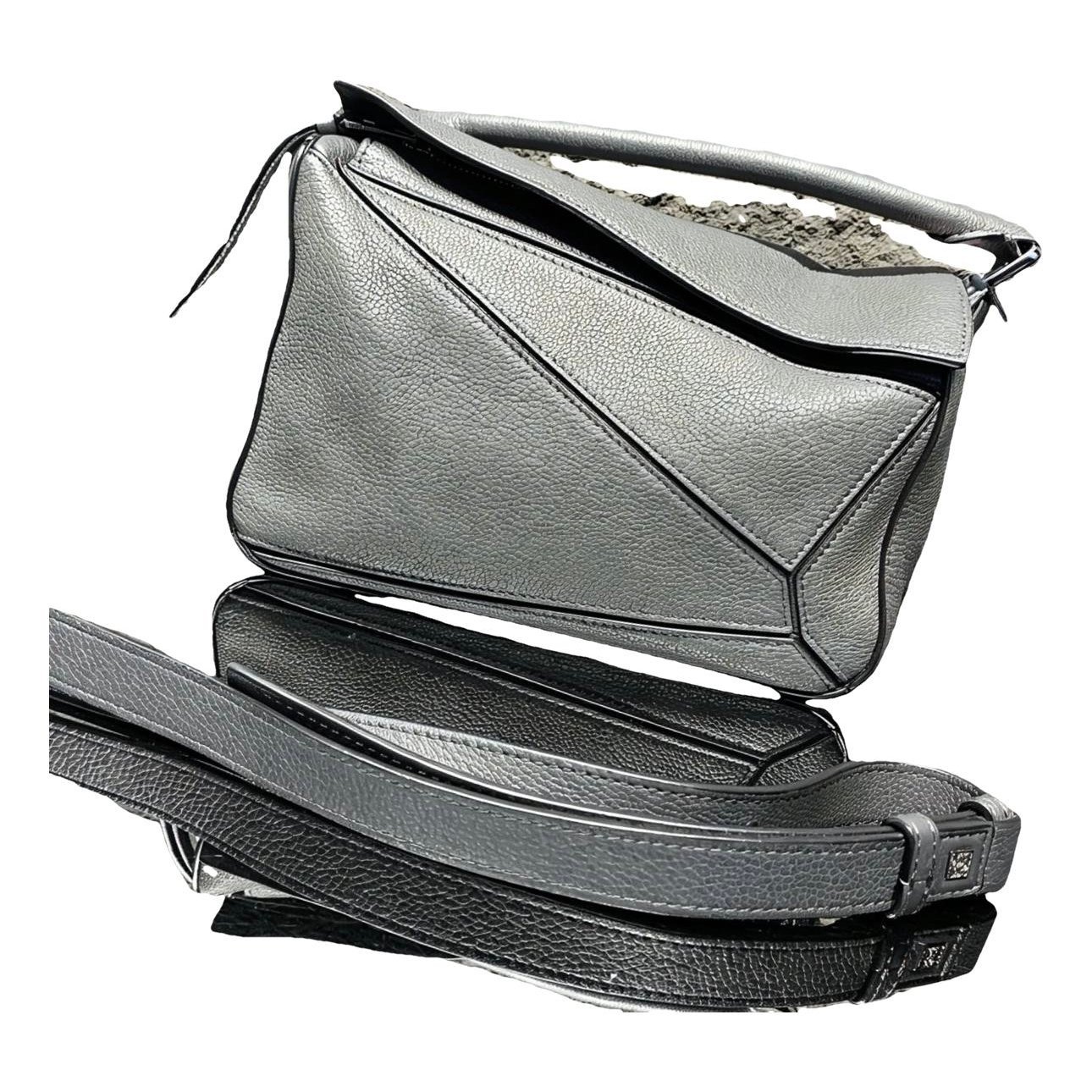 Puzzle leather handbag
