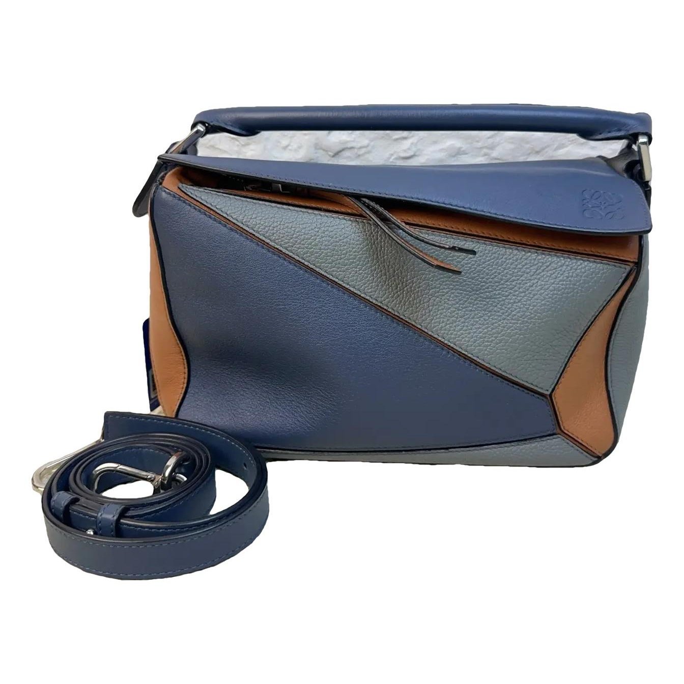 Puzzle leather handbag