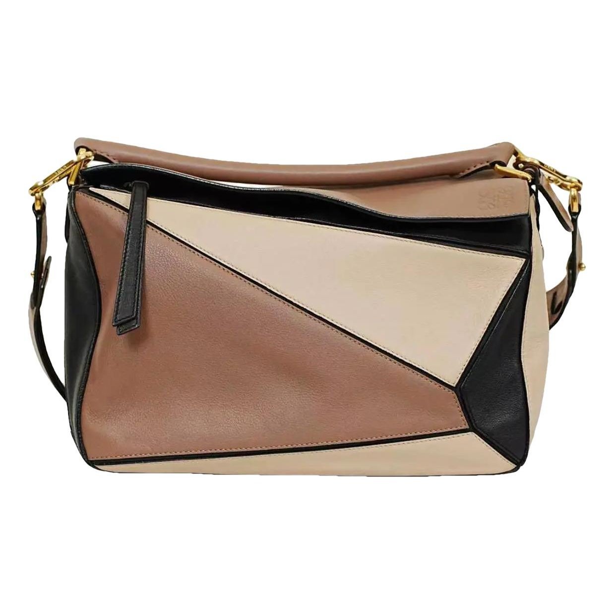 Puzzle leather handbag