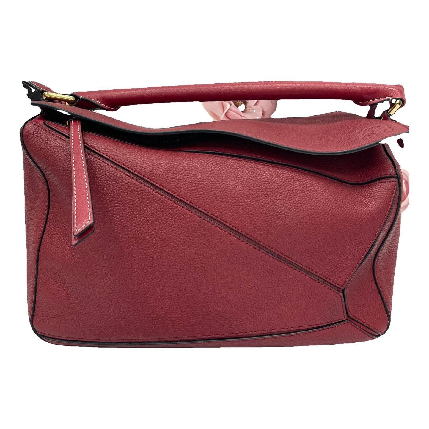 Puzzle leather handbag