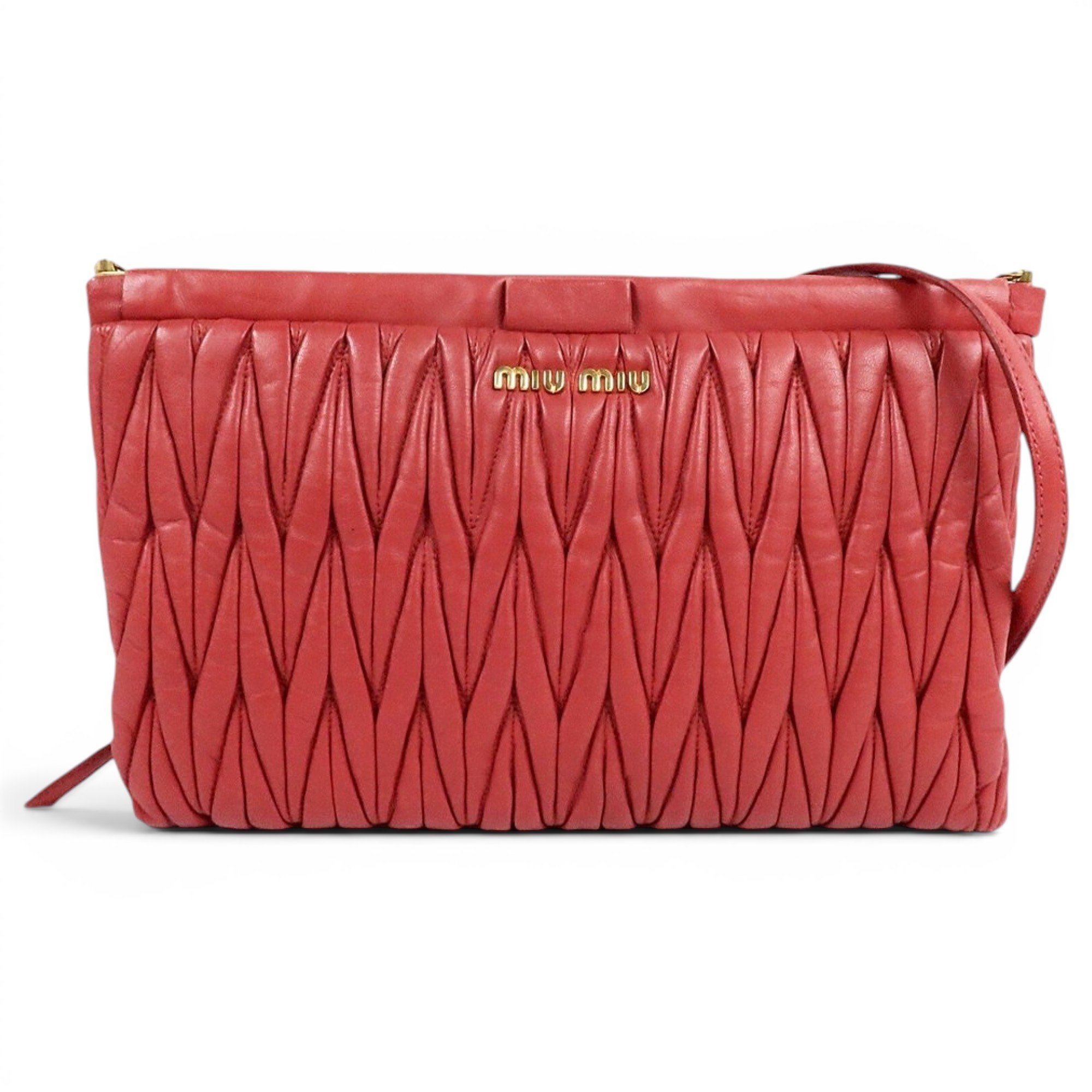 Matelassé leather clutch bag