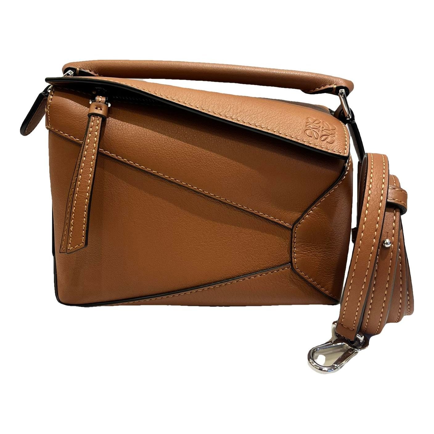 Puzzle leather handbag
