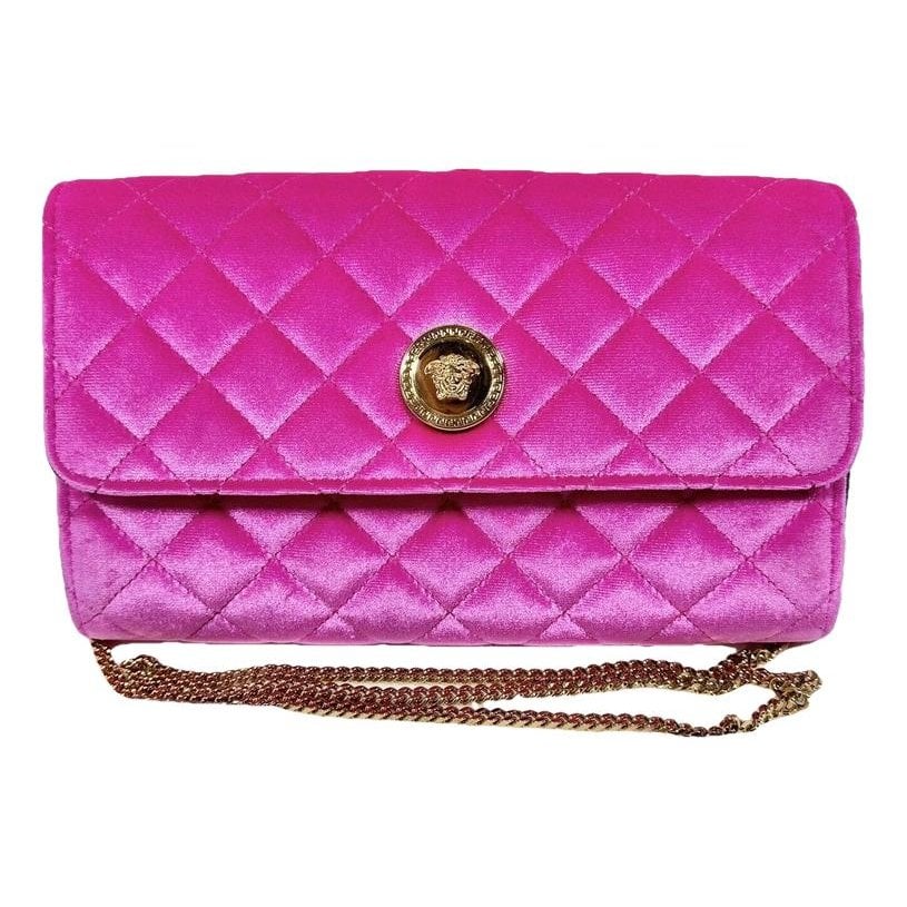 La Medusa velvet clutch bag
