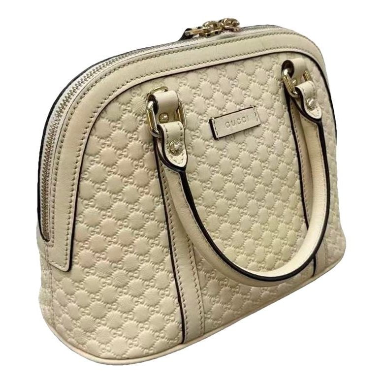 Dôme leather handbag