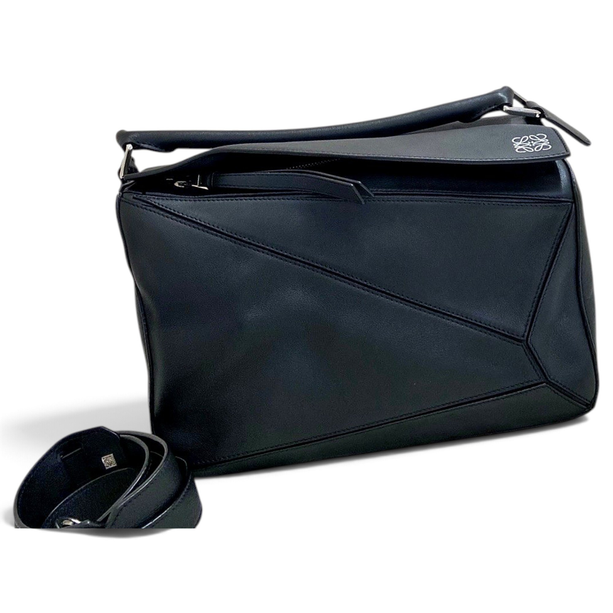 Puzzle leather handbag