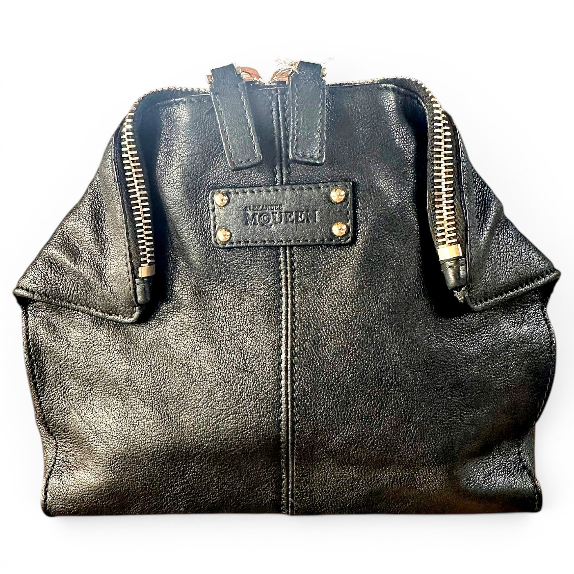Manta leather clutch bag