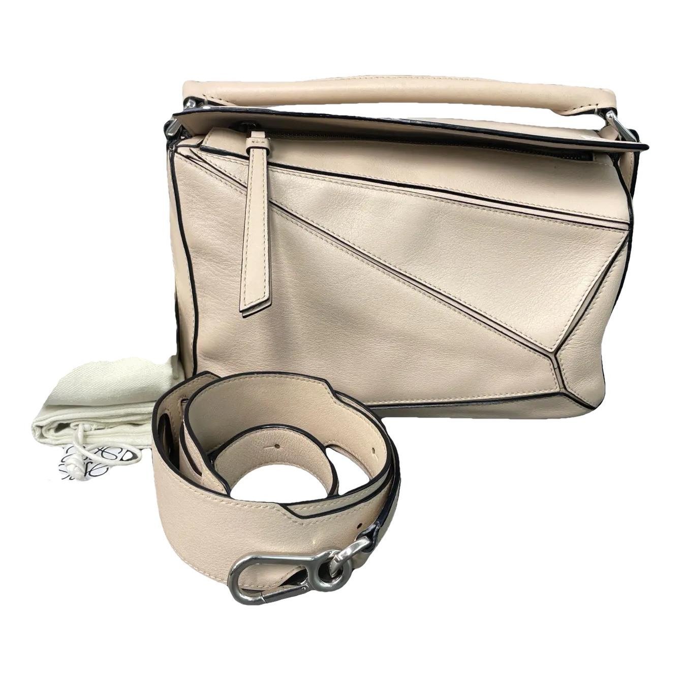 Puzzle leather handbag