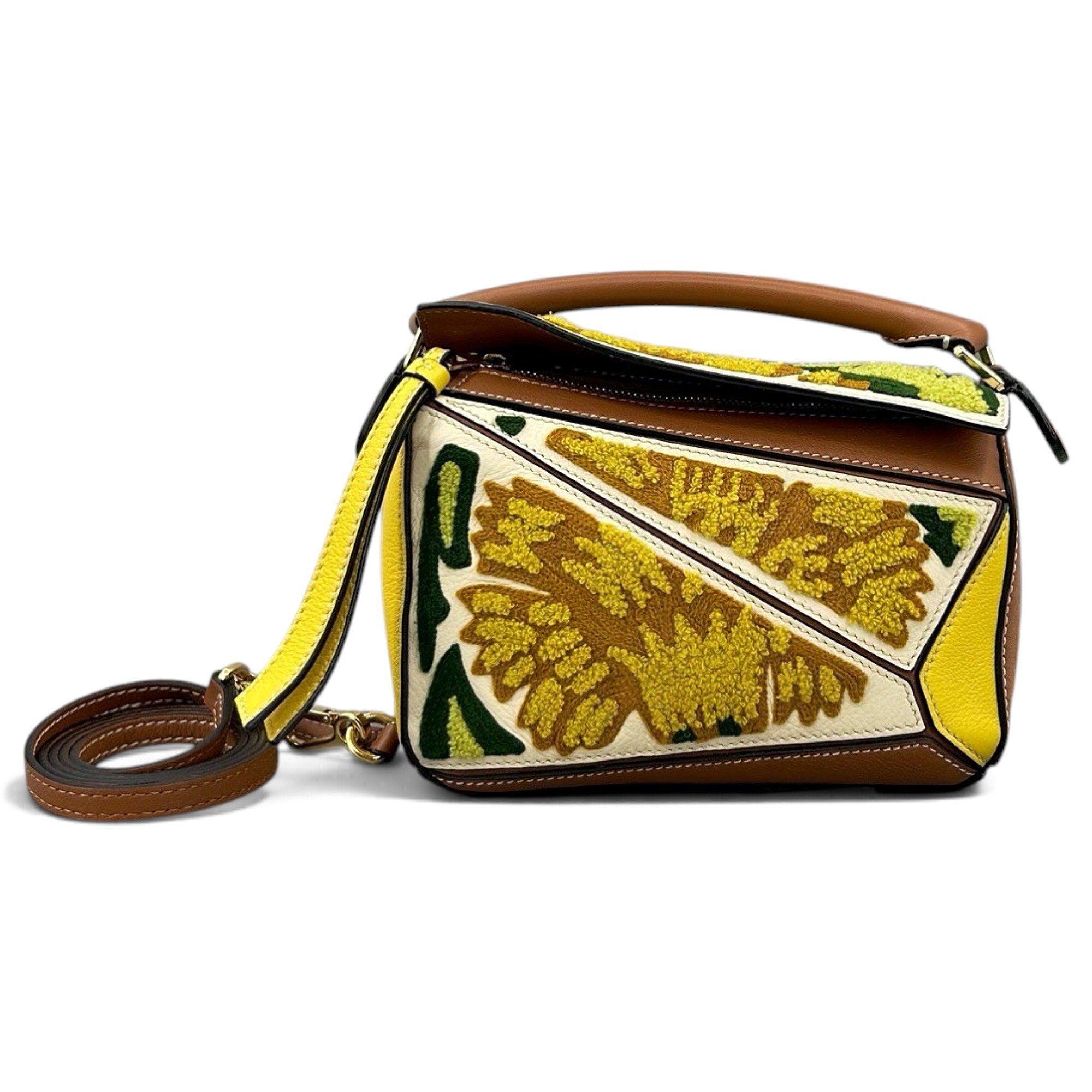 Puzzle leather handbag