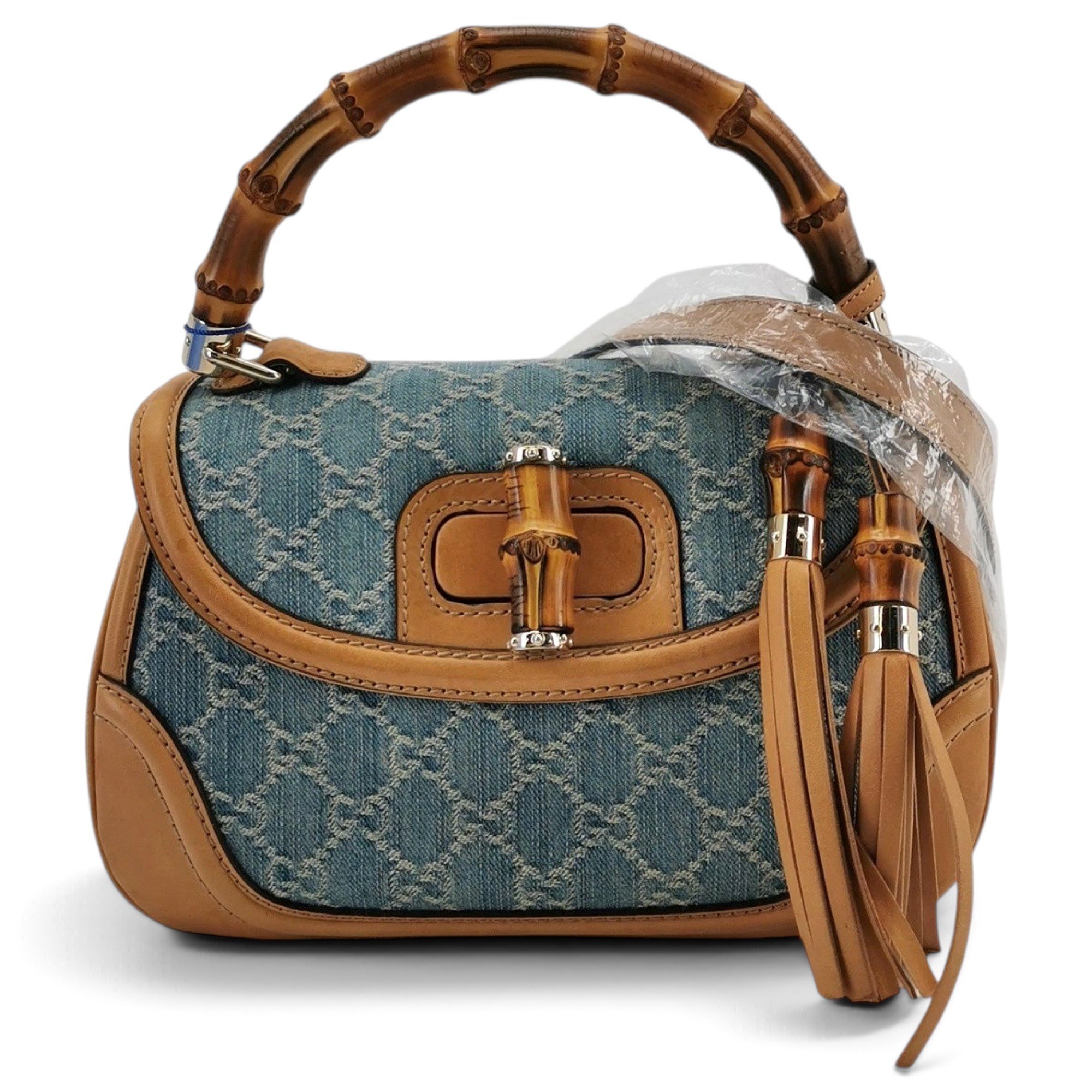 Convertible Pompon Bamboo Top Handle leather handbag